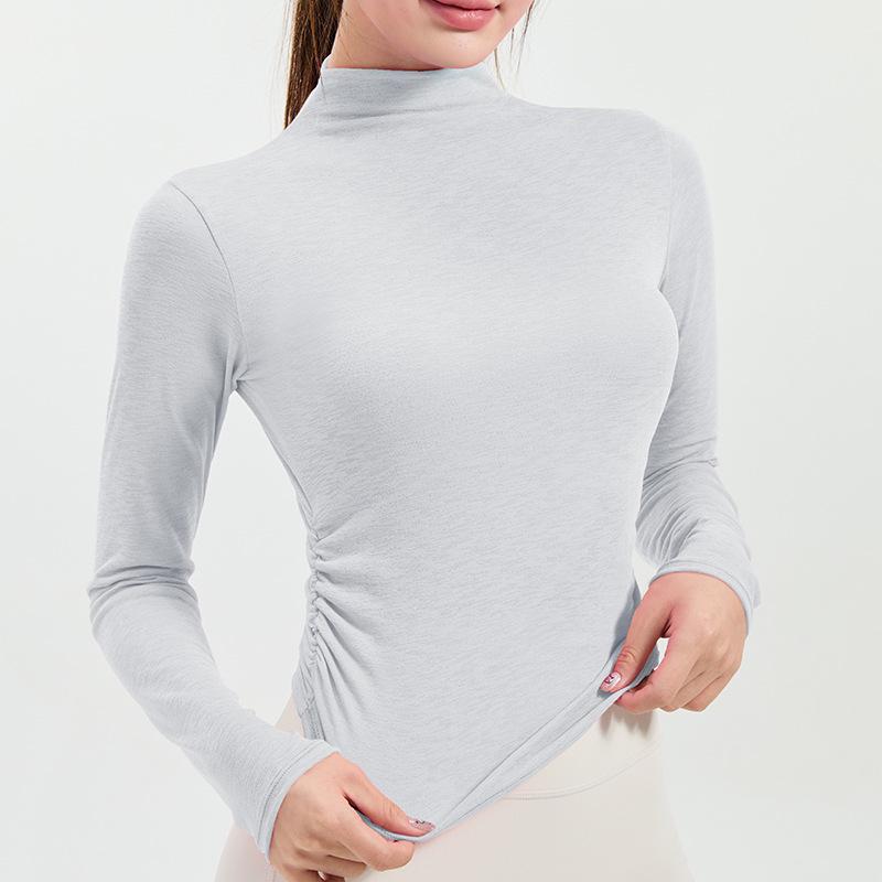 

Стильный утягивающий топ с длинным рукавом и полуводолазкой для занятий йогой и бега