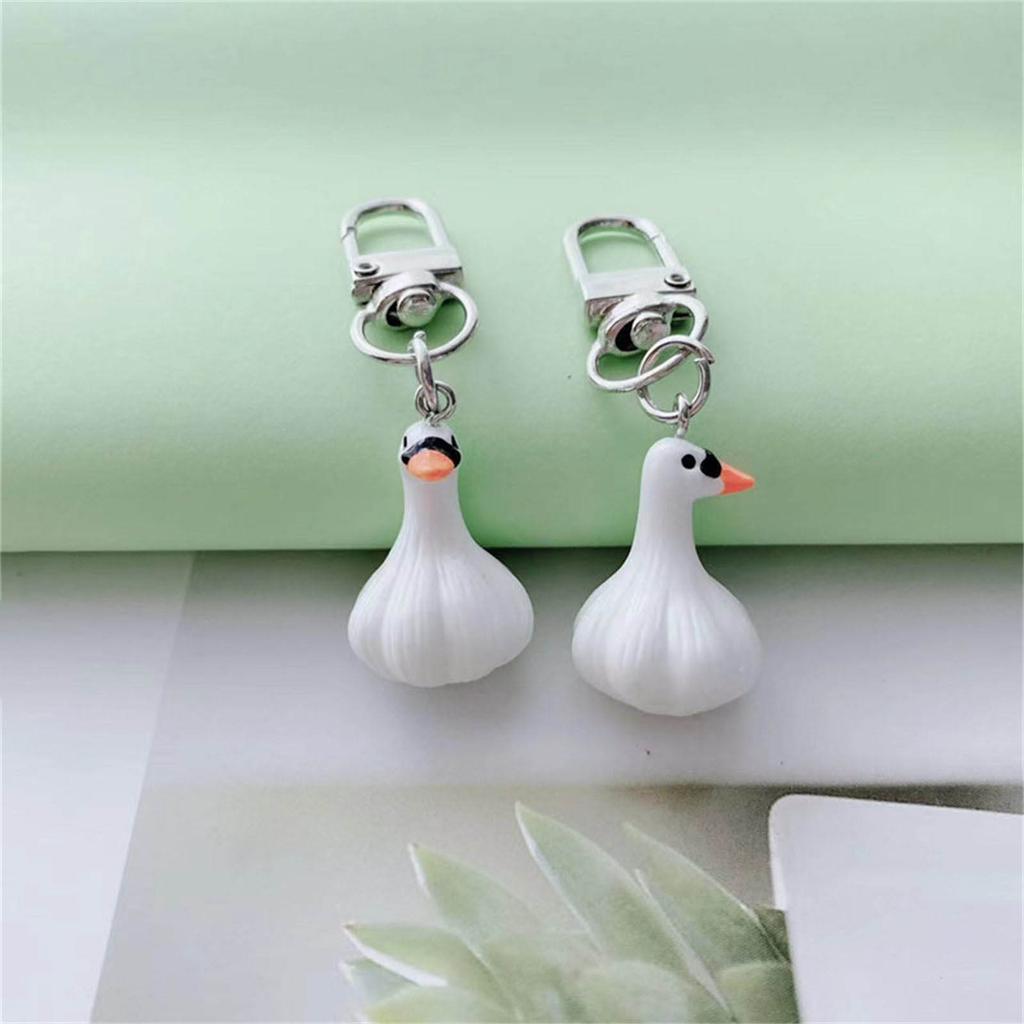 Kreativer Knoblauchförmiger Schlüsselanhänger Knoblauch-Enten-Schlüsselanhänger Blickfangendes Schlüsselzubehör Cartoon-Schlüsselhalter Geeignet für den Alltag