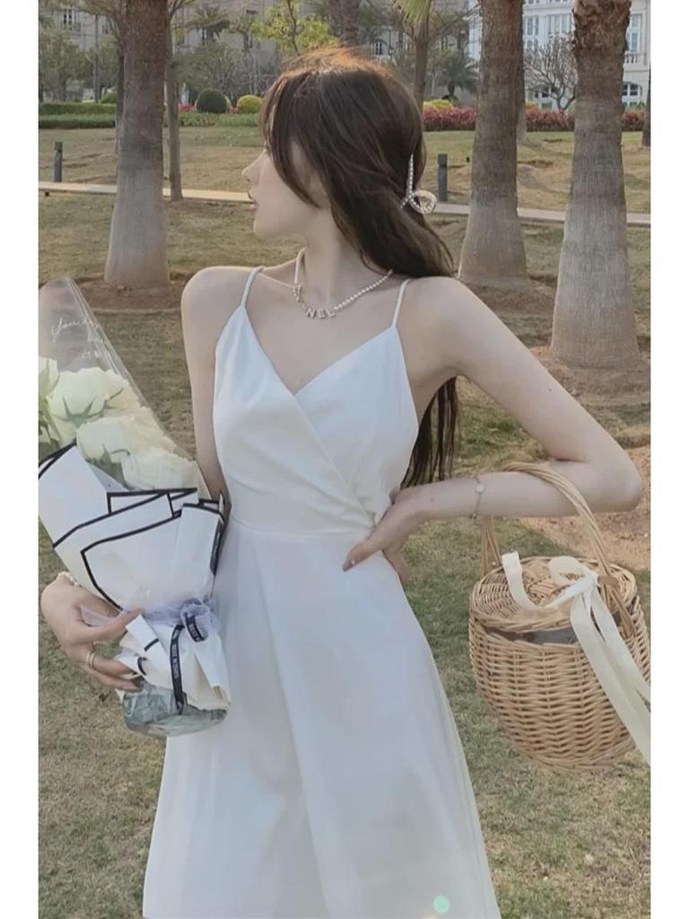 Stylish Backless V-Neck Summer Dress with Lined Skirt In Trendy White.