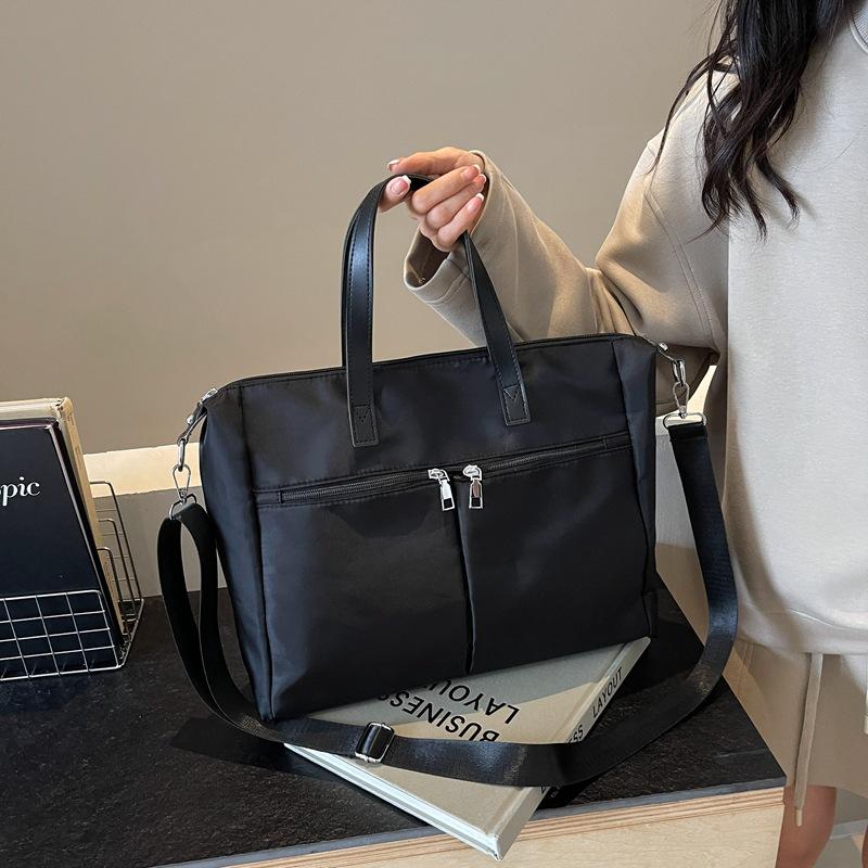 Korean version of simple canvas fashionable large-capacity women's bag 2025 autumn casual foreign style commuter bag shoulder armpit bag