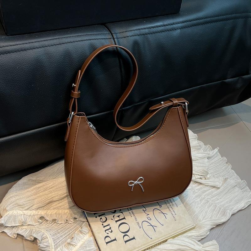 Neue modische einfarbige Tasche Textur lässige Schleife Knödeltasche Einzelne Schulter Achseltasche Mondzahn-Tasche schwarz