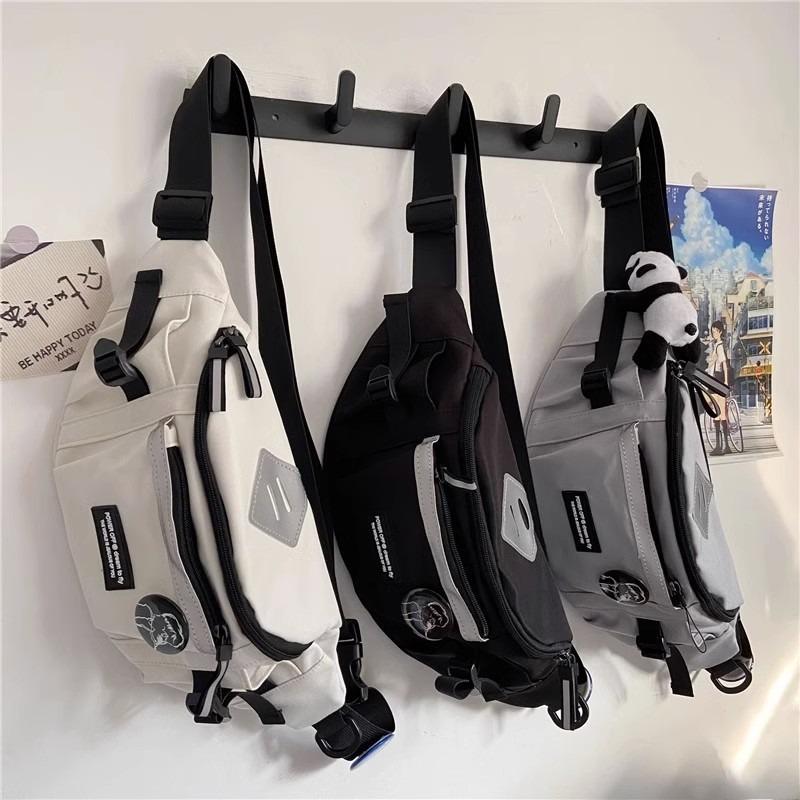 Bags women's autumn and winter new messenger bags men's trendy fanny packs breast bags canvas shoulder dumplings bags luggage