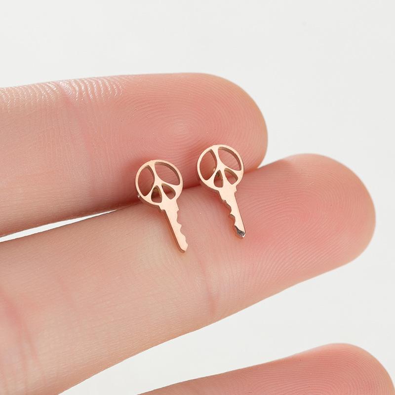 Unisex Stainless Steel Punk Musical Note Earrings with Whirlwind Design