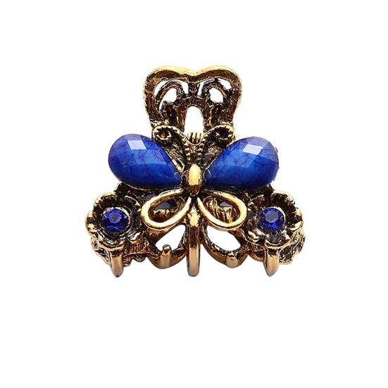 

Металлическая заколочка крабик в виде бабочки.Четыре расцветки на выбор синий