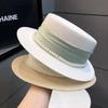 French Celebrity Style Pearl White Top Hat Women Spring and Summer Sunshade Sun Protection Travel Holiday Flat Top Straw Hat Big Brim