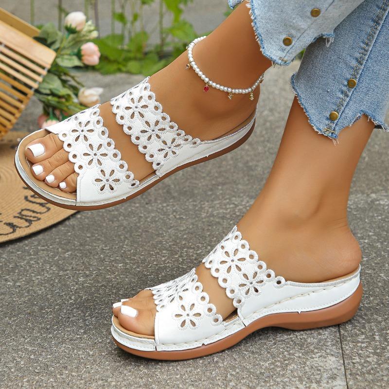 Thick-bottomed one-word slippers women's hollowed-out casual flowers large-size new slope heel cool slippers women's summer