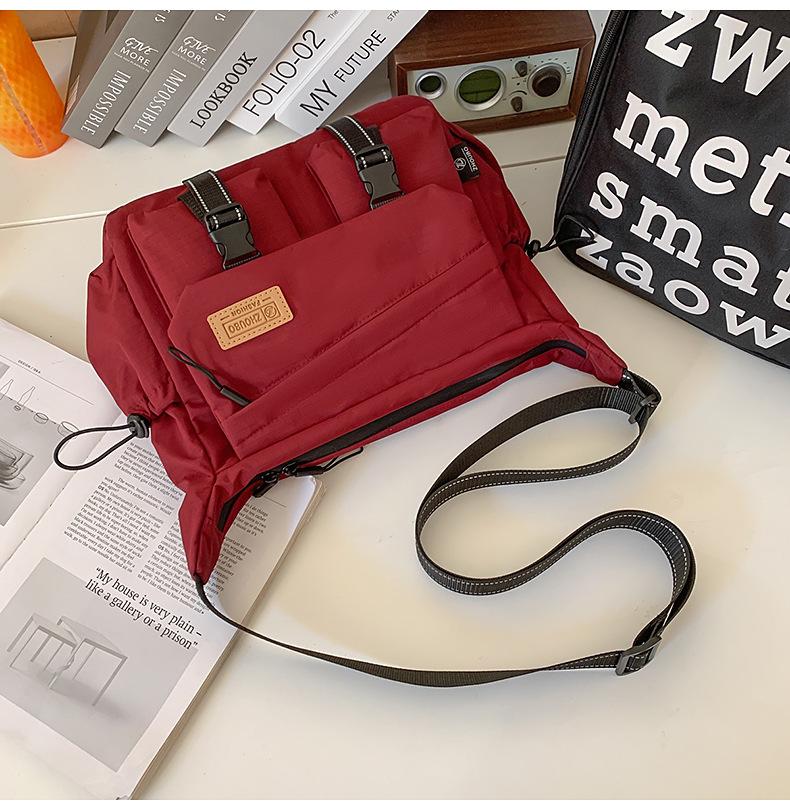 Schoolbag women's messenger bag tide brand ins tooling style Japanese casual men's bag large capacity shoulder bag personalized mailman bag tide