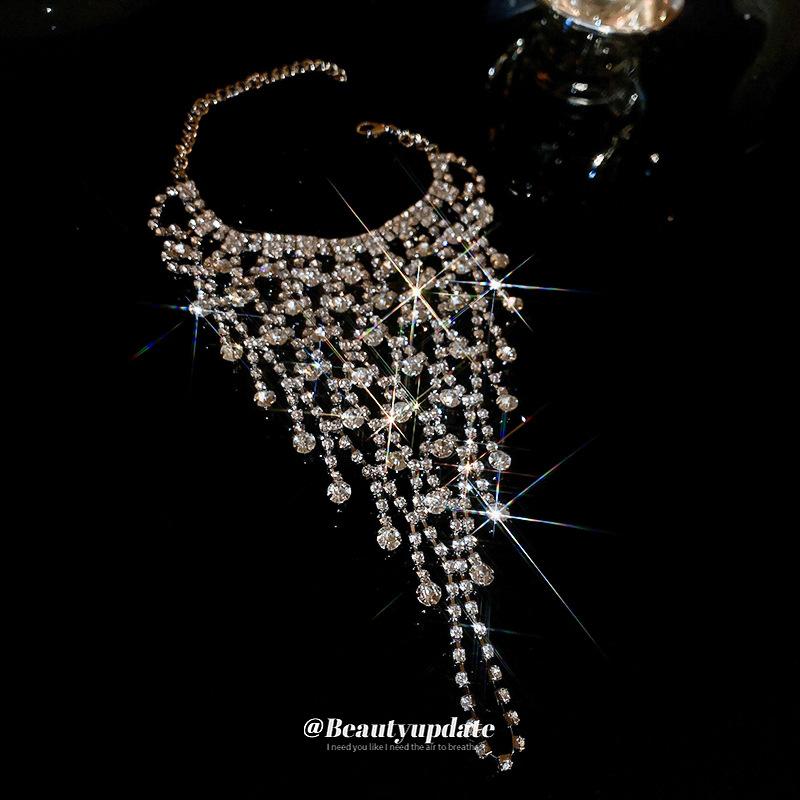 Diamond-encrusted multi-layer tassel bracelet light luxury integrated ring bracelet trend exquisite design jewelry wholesale