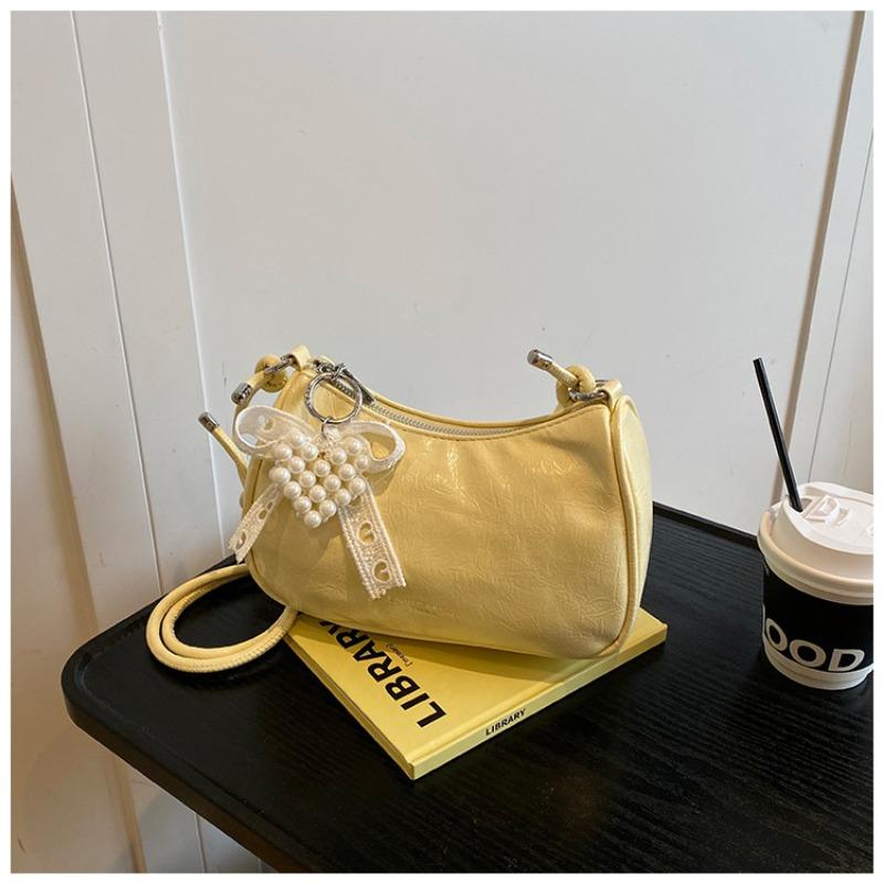 

Niche design bag women s new summer versatile chain messenger bag commuter hand-held pleated bag жовтий