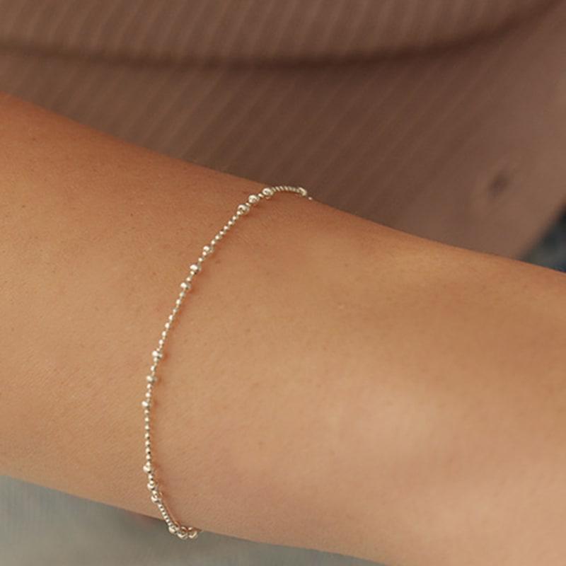 

Lewe [6mm+10mm Pearl Earrings Free] Shining Cutting Ball Bracelet Silver