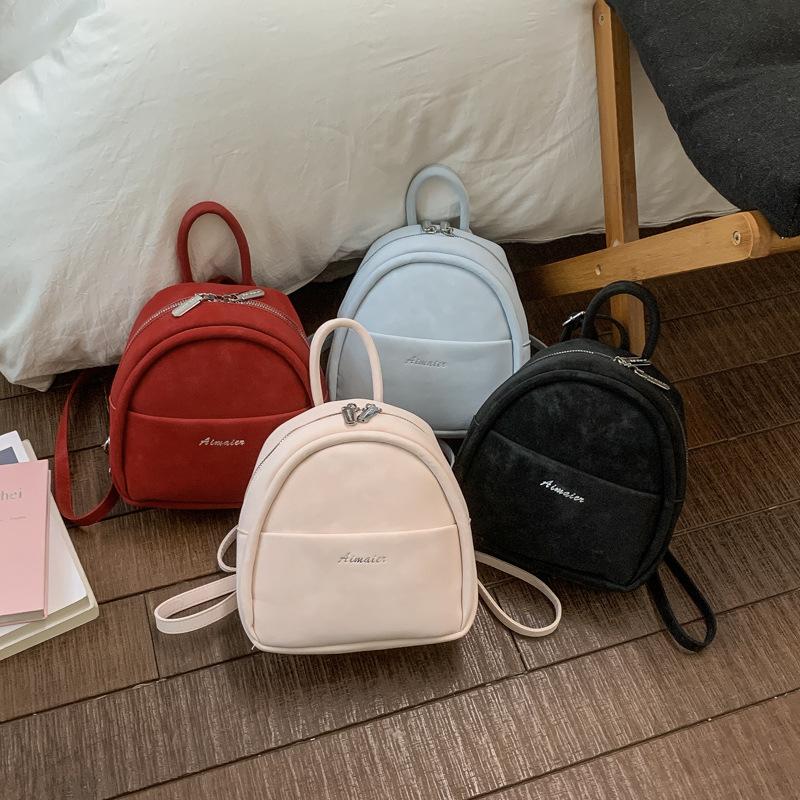 Schoolbag Korean version small fresh solid color fashion backpack women's 1011 new light travel foreign style casual portable small backpack
