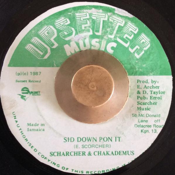 

7inch Record SCHARCHER CHAKADEMUS Sid Down Pon It NONE Upsetter Music 1987 Jamaica Reggae Ska Dub Used