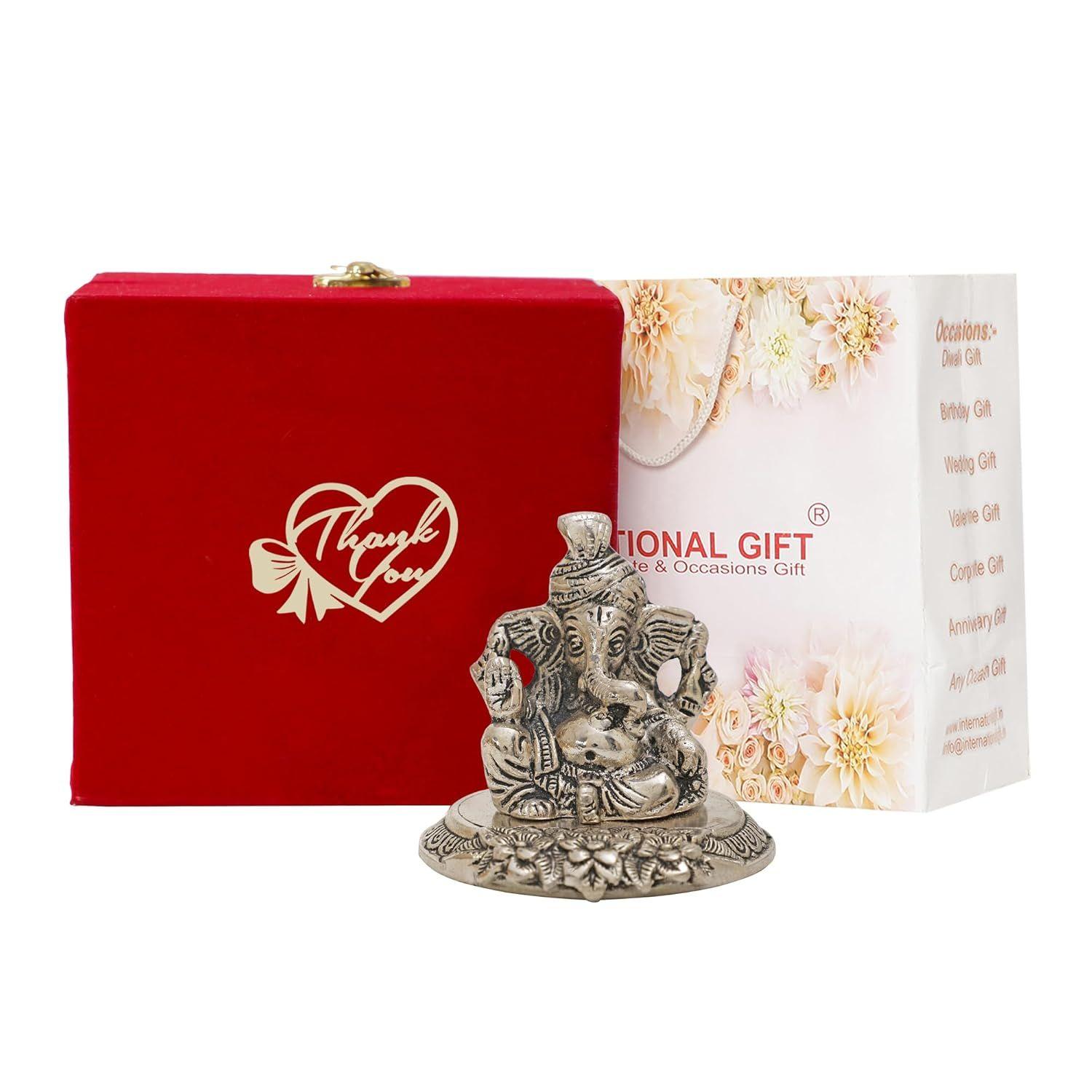 

Посеребренная статуэтка Господа Ганеши в красивой подарочной коробке с надписью «Спасибо» и пакете для переноски