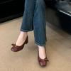 Retro bow gold buckle single shoes women's 2025 new one-pedal round head thick heel grandma shoes