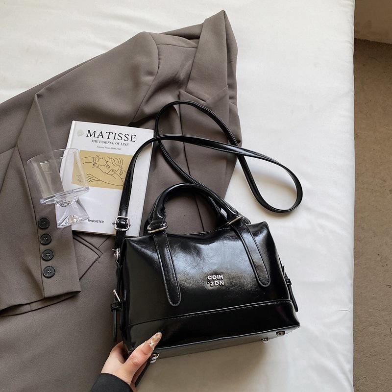 

Premium bag women s spring summer new niche design messenger bag portable pillow bag