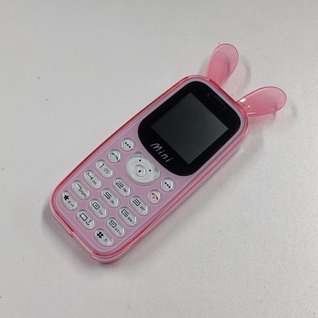 

New H21 Pig Style GSM 2G Cellphone Mini Cartoon Cute Mobile Phone 1.44inch Screen MTK Dual SIM Card Cheap Phone Support Torch and FM рожевий