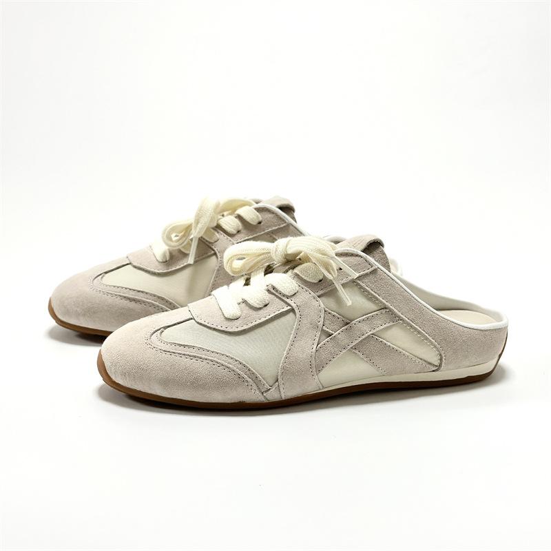 

Korean version of German training half slippers women s 2025 summer wear flat-bottomed leather bag head half slippers without heel lazy little white 40 абрикосовый