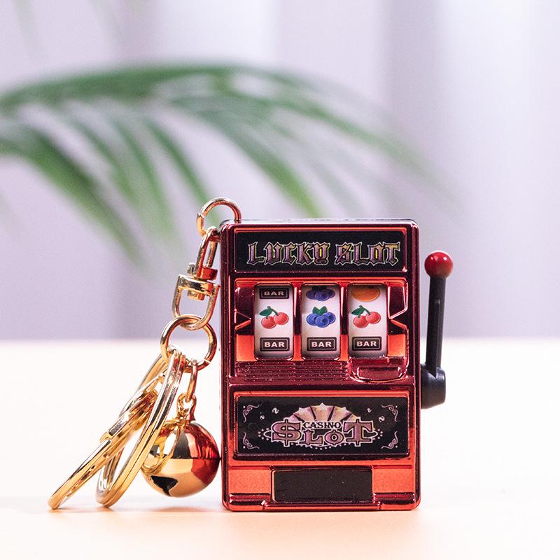 Gold-Plated Creative Tiger Fruit Machine Keychain Toy with Lottery Play Feature