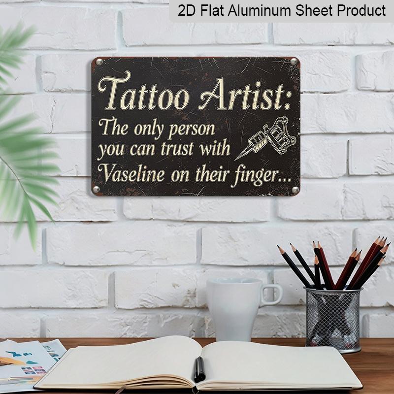 2D Flat 1pc Vaseline Tattoo Artist Sign | Funny Tattoo Quote Wall Art Decor for Studio or Home, Manufactured Aluminium, Vintage Style, Wall Hanging
