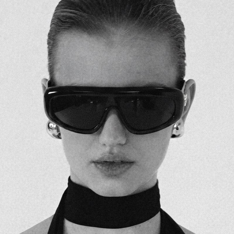 Retro-style one-piece lens glasses for street fashion, hip-hop trend sunglasses, and outdoor sun-protection shades.
