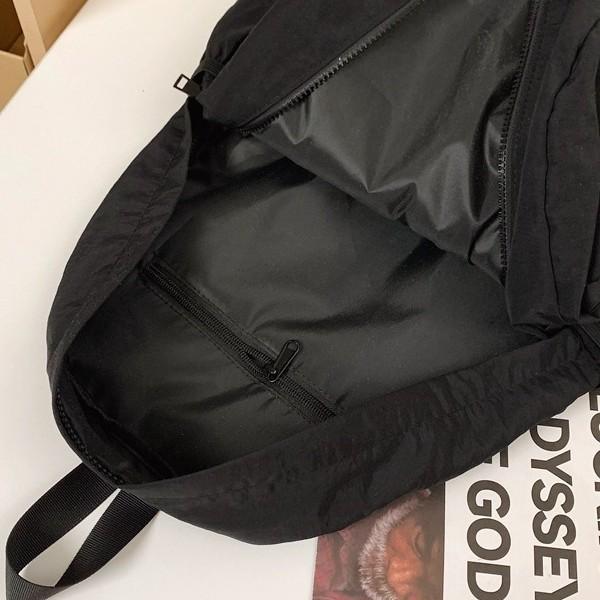 Schoolbag niche new backpack women's fashion versatile college student large capacity backpack Korean version casual light travel bag