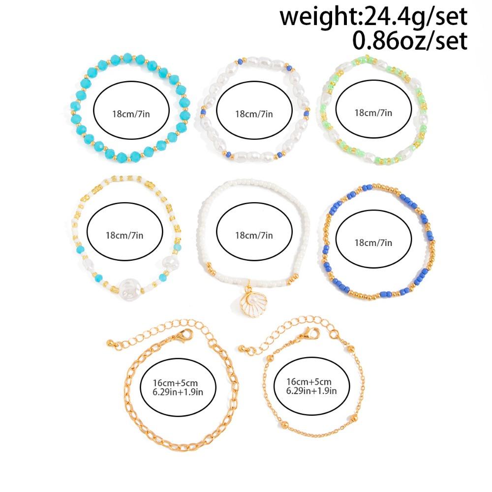 8-teiliges Set Boho Perlen-Stapelarmband-Set für Damen Meeresmuschel Perlen-Anhänger Mehrschichtig Blaue Rocailles Strandurlaub Schmuck
