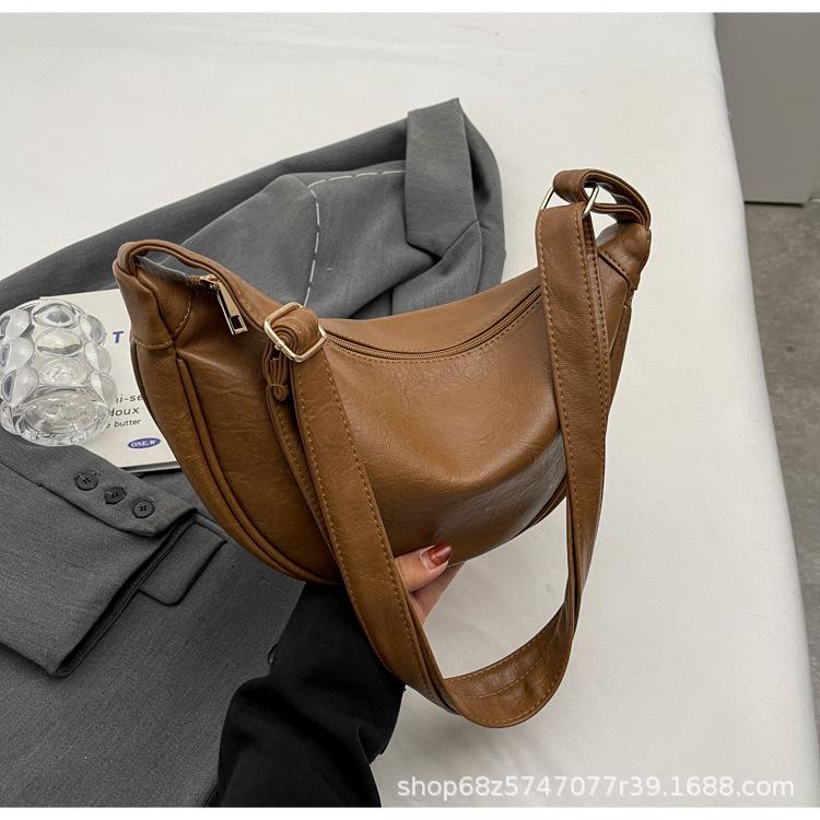 

Korean version ins small bag female messenger bag 2025 new spring and summer niche design retro shoulder dumpling bag коричневый