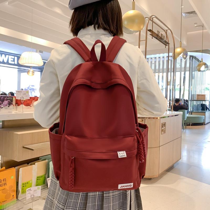 Schoolbag New Men's Casual Schoolbag Solid Color School Large Capacity Female Student Backpack Junior High School College Student Nylon Backpack
