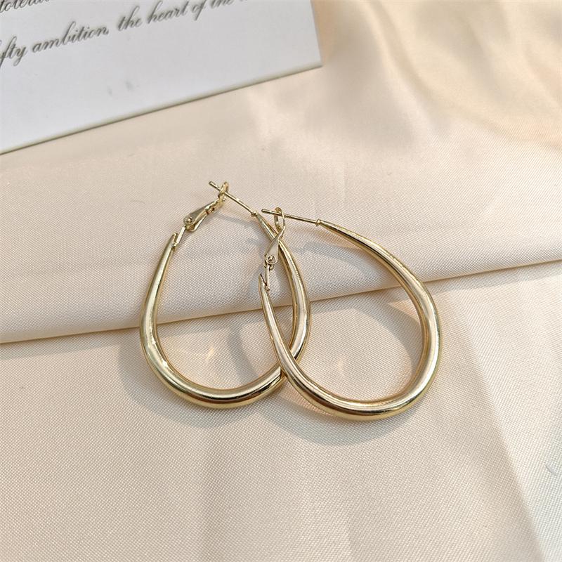 

Water Drop Dangle Earrings for Women New Exaggerated Metal Gold Color Copper Color Hollow Geometric Statement Hanging Earrings