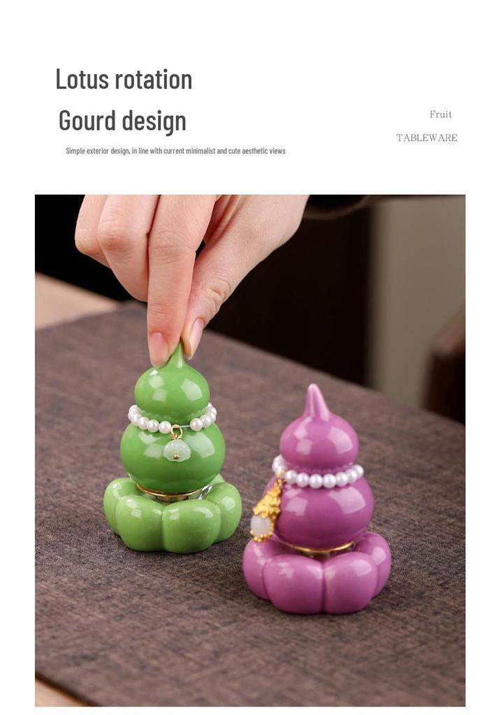 Vibrant Rotating Gourd Ornament: Stylish and Fun Tea Pet with Custom Logo Option
