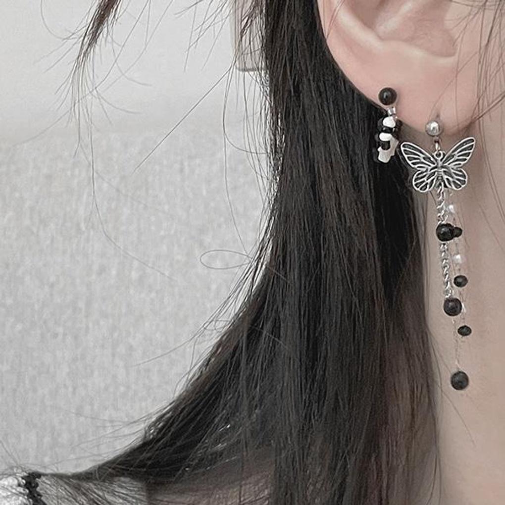 

Surgical steel white and black bead two-way piercing