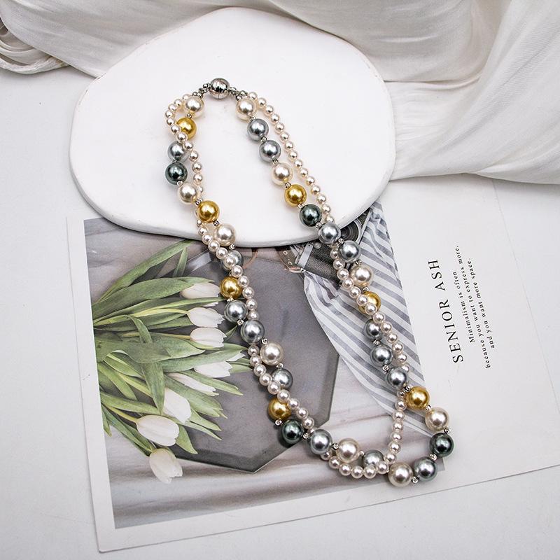 Elegant Double-Layer Pearl Magnetic Clasp Necklace for Women: Versatile, Fashionable Clavicle French Sweater Chain.