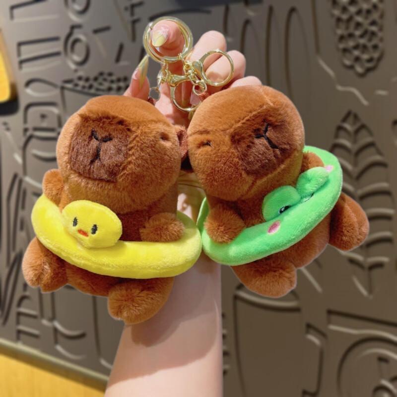 Набор плюшевых брелоков Капибара с плавательным кольцом (3 случайных стиля)