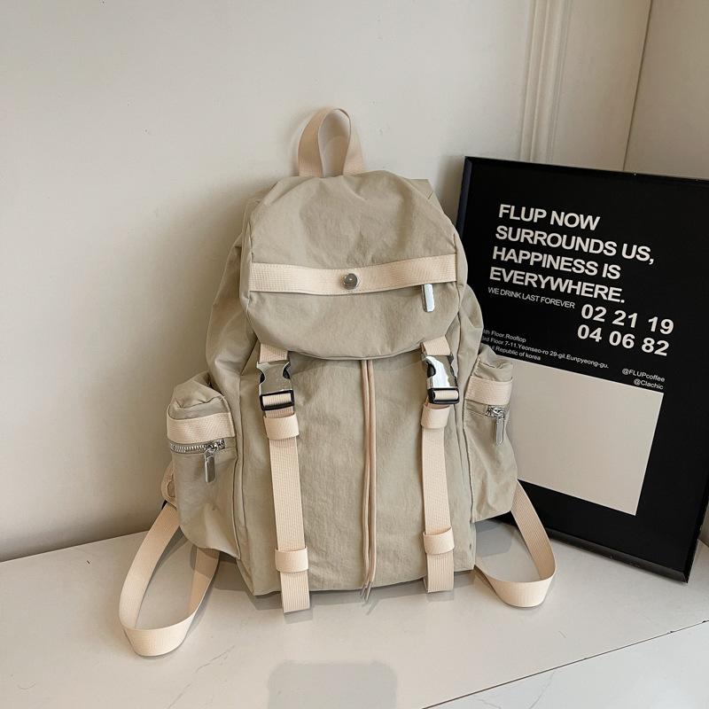 Niche design backpack female college students large-capacity travel backpack Japanese simple commuter high school students schoolbag tide