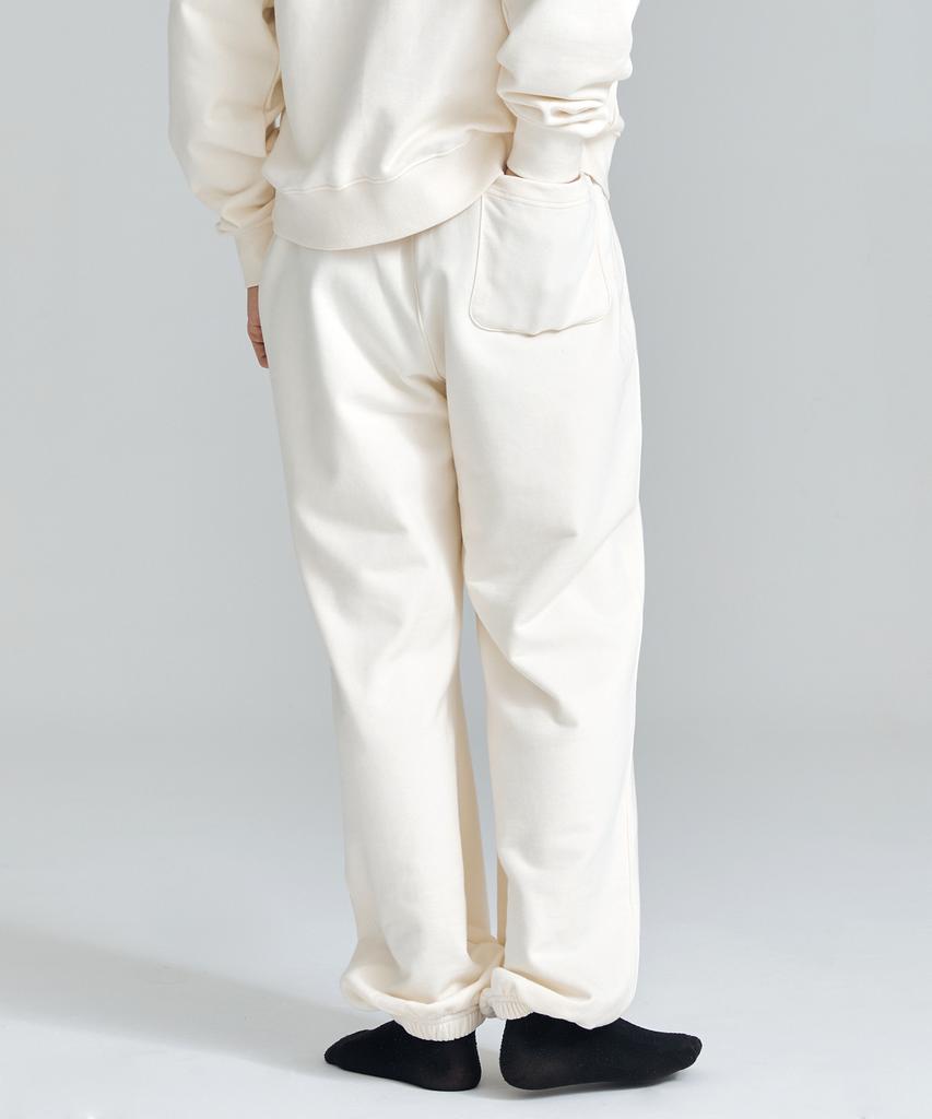 Daenkkomma Crayon Shin-Chan 1992 Face Embroidery Sweatpants (Black, Cream)