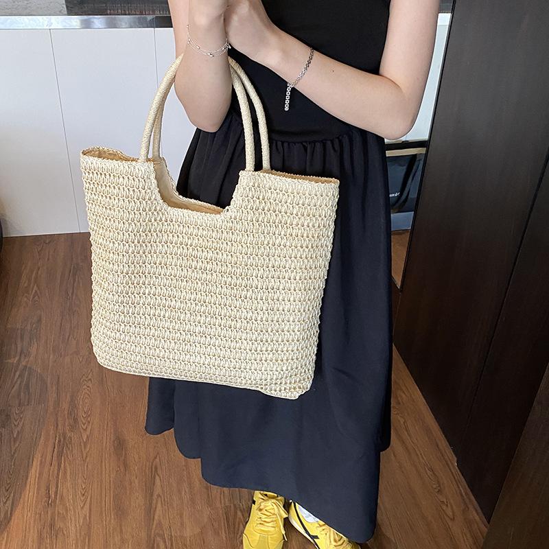 Summer woven bag women's large-capacity new niche design shoulder bag simple commuter bag