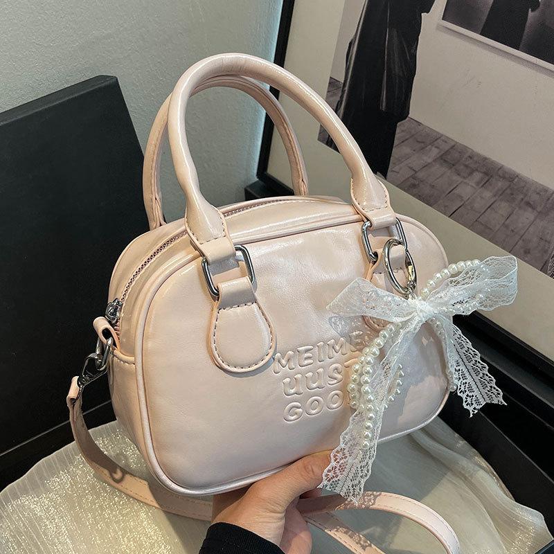 Spring and Summer Popular Korean Niche High-end Portable Bowling Bag Casual Versatile Temperament Foreign Style Messenger Women's Bag