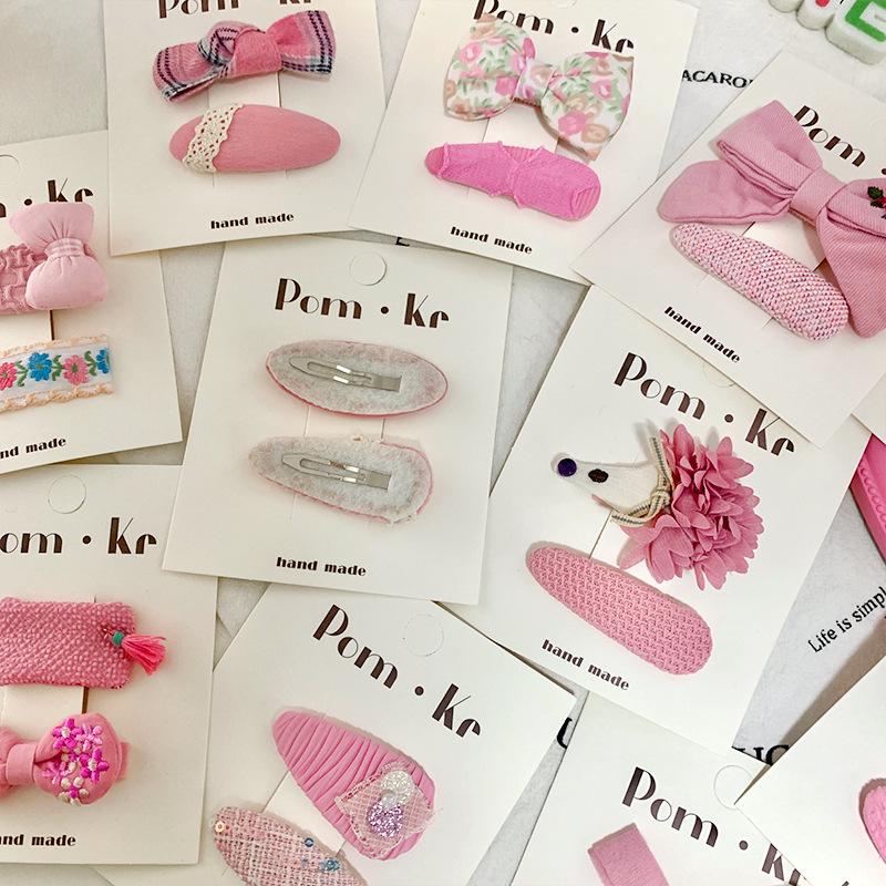 Koreańska spinka do włosów z kokardką w kolorze różowym, idealna do dziecięcych grzywek i kręconych włosów