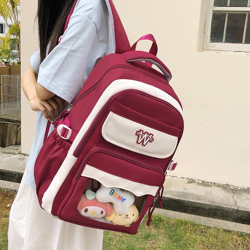 College junior high school student schoolbag, primary school student contrasting color backpack, new large-capacity high-value schoolbag