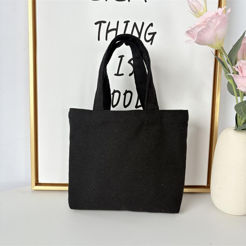 Effenkleurige eenvoudige lunchtas, draagbare canvas tas, kleine stoffen tas, draagbare canvas tas voor het opbergen van diverse spullen