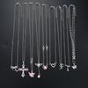 Set di 9 Collane con Ciondoli Eleganti in Zircone da Donna Moda Colore Rosa Croce Farfalla Cuore Fiocco Collane Gioielli da Festa Regalo
