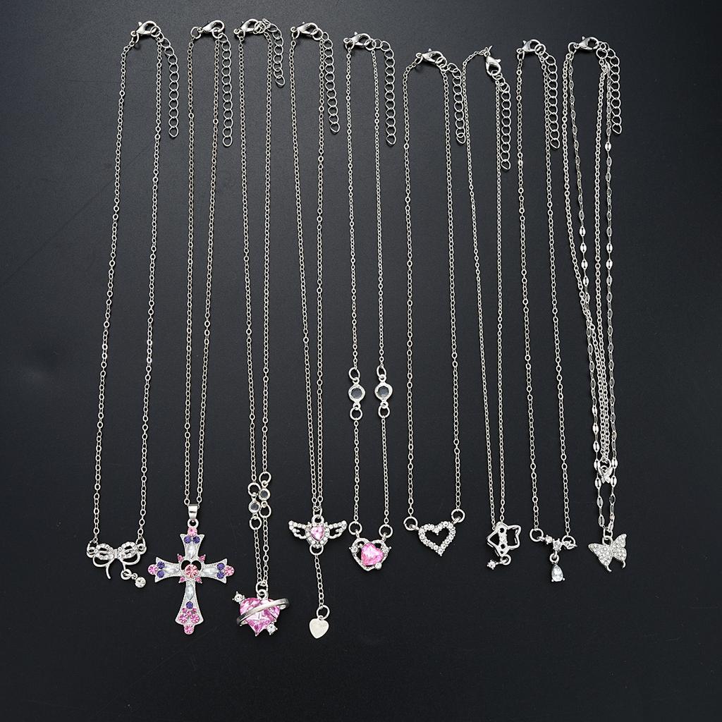 Set di 9 Collane con Ciondoli Eleganti in Zircone da Donna Moda Colore Rosa Croce Farfalla Cuore Fiocco Collane Gioielli da Festa Regalo