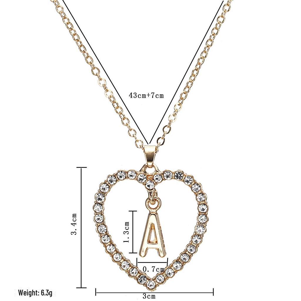 Schicke europäische und amerikanische Diamant-Herzkette mit 26 Buchstaben, Pfirsichherz-Design. Vielseitige und elegante Schlüsselbeinkette für Damen.