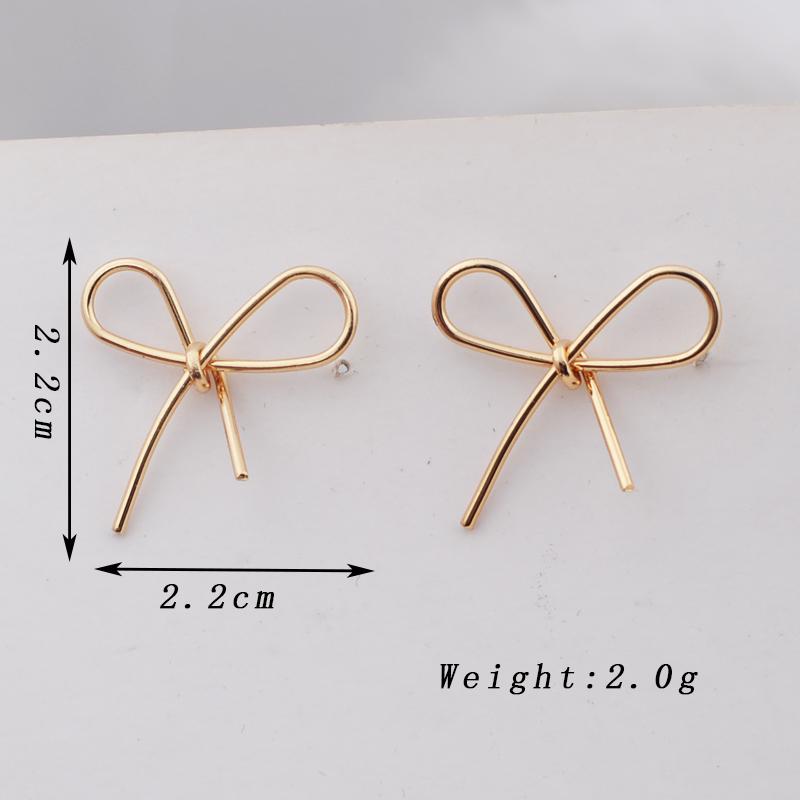 

Trendy Bow Knot Stud Earrings for Women Golden Hollow Out Metal Earrings Wedding Party Sweet Simple Zircon Girls Gift