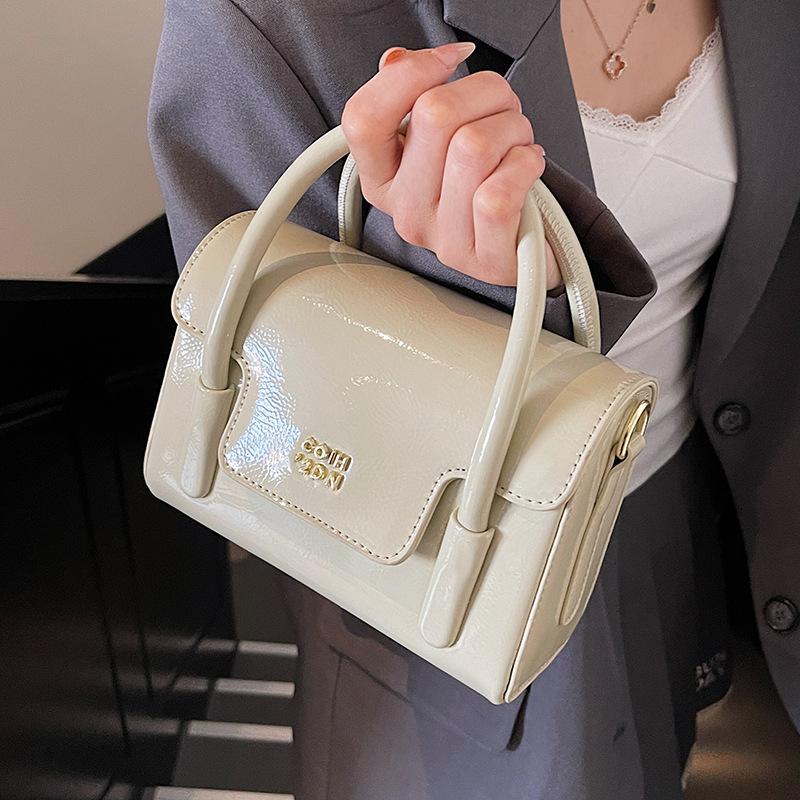 This year, it is popular for casual and simple oil wax leather portable small square bags, versatile solid color high-end texture women's messenger