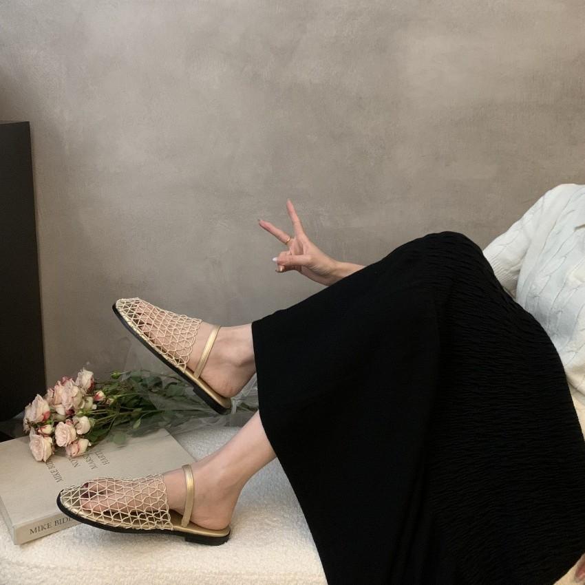 Leather bag head back strap fishing net flat sandals Roman shoes 25 summer new hollow comfortable beach half slippers