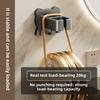 [Wall-Mounted | Space-Saving] Wall-Mounted Hair Dryer Holder | Space-Saving,Easy Installation | Sleek Black Design, Durable Plastic, Metallic Accents
