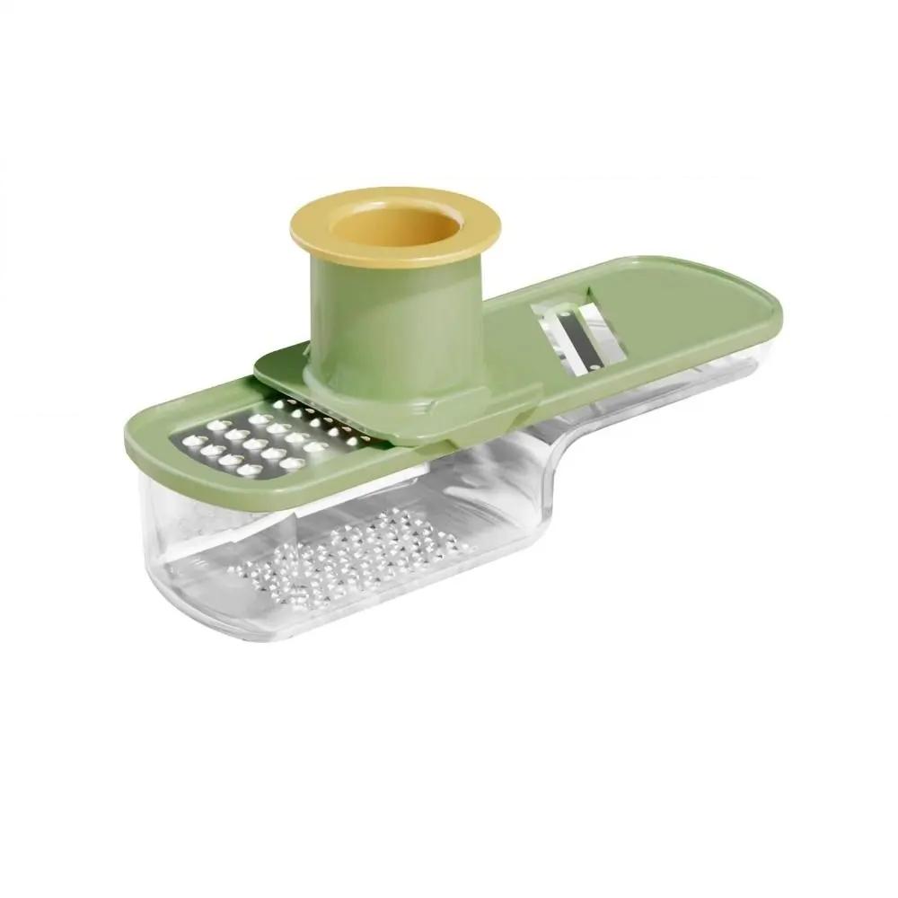 Three-in-one durable plastic manual household garlic mashing machine, grinder, shredder, multi-functional ginger and garlic tool