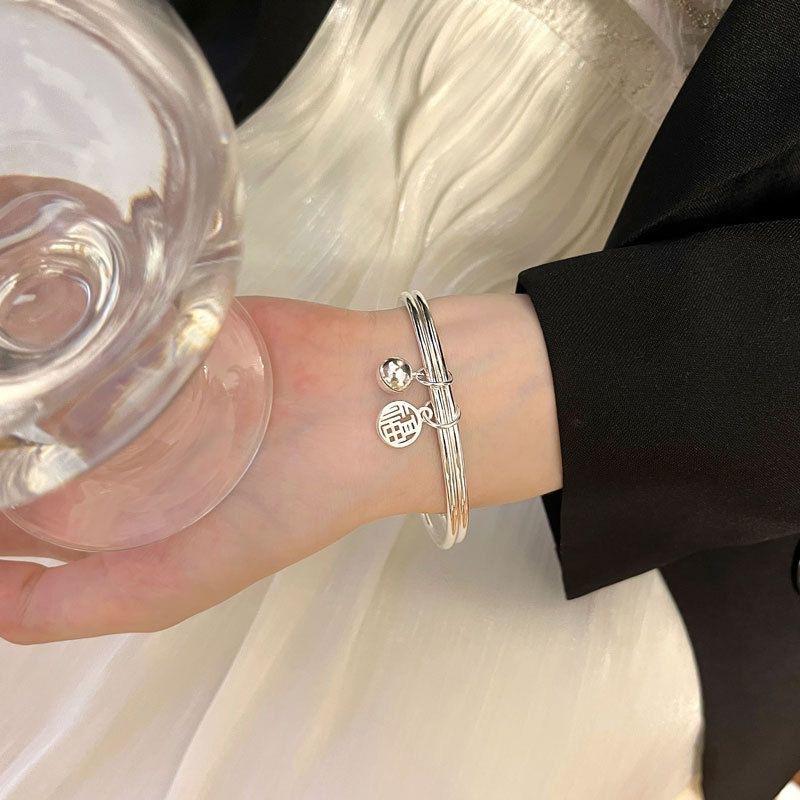 Fu brand bell bracelet double ring female niche bracelet ins is not colored niche design high sense temperament simple