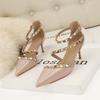 Simple stiletto high heels, shallow mouth pointed rivets, hollowed-out one-word sandals